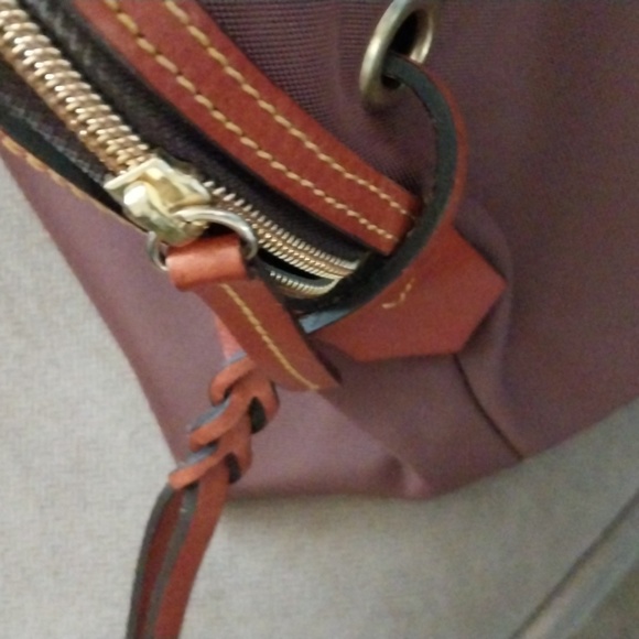 Dooney & Bourke medium satchel. Canvas w/leather trim. Key keeper. Used once. - Picture 4 of 6